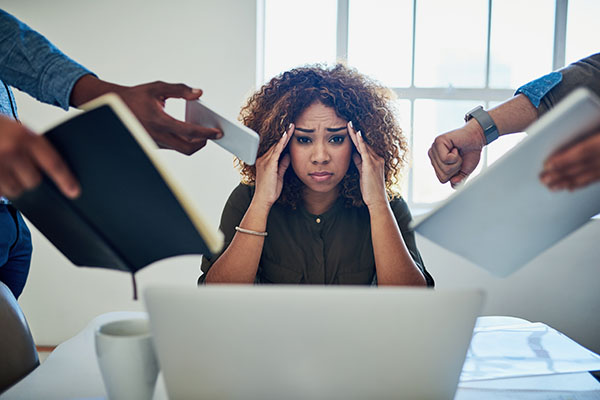 A photo of a stressed out young woman.